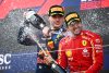 SUZUKA, JAPAN - APRIL 07: Race winner Max Verstappen of the Netherlands and Oracle Red Bull Racing and Third placed Carlos Sainz of Spain and Ferrari celebrate on the podium during the F1 Grand Prix of Japan at Suzuka International Racing Course on April 07, 2024 in Suzuka, Japan. (Photo by Clive Mason/Getty Images) // Getty Images / Red Bull Content Pool // SI202404070322 // Usage for editorial use only //